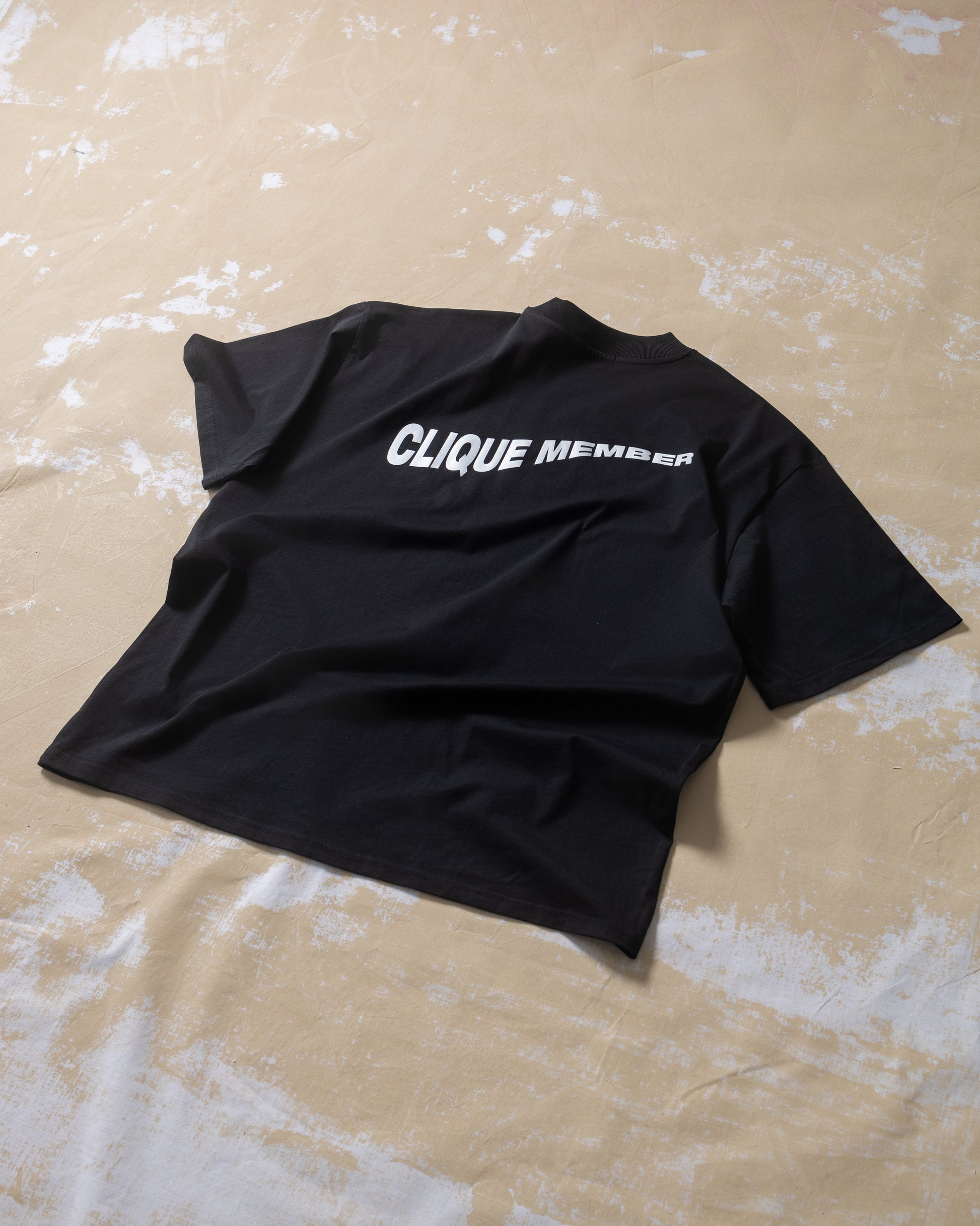 REFLECTIVE CLIQUE MEMBER TEE